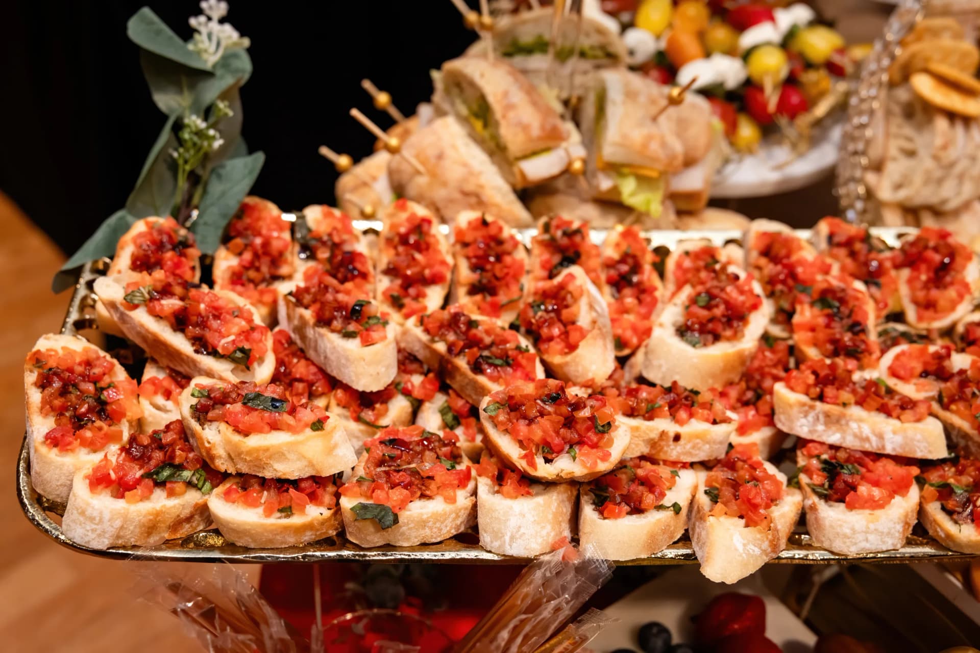 Tray of tomato and basil bruschetta prepared for a L’Amore catering table