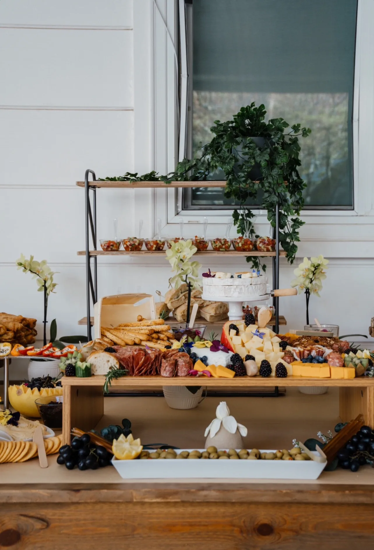 Original L’Amore grazing board image with cheese and honey on marble