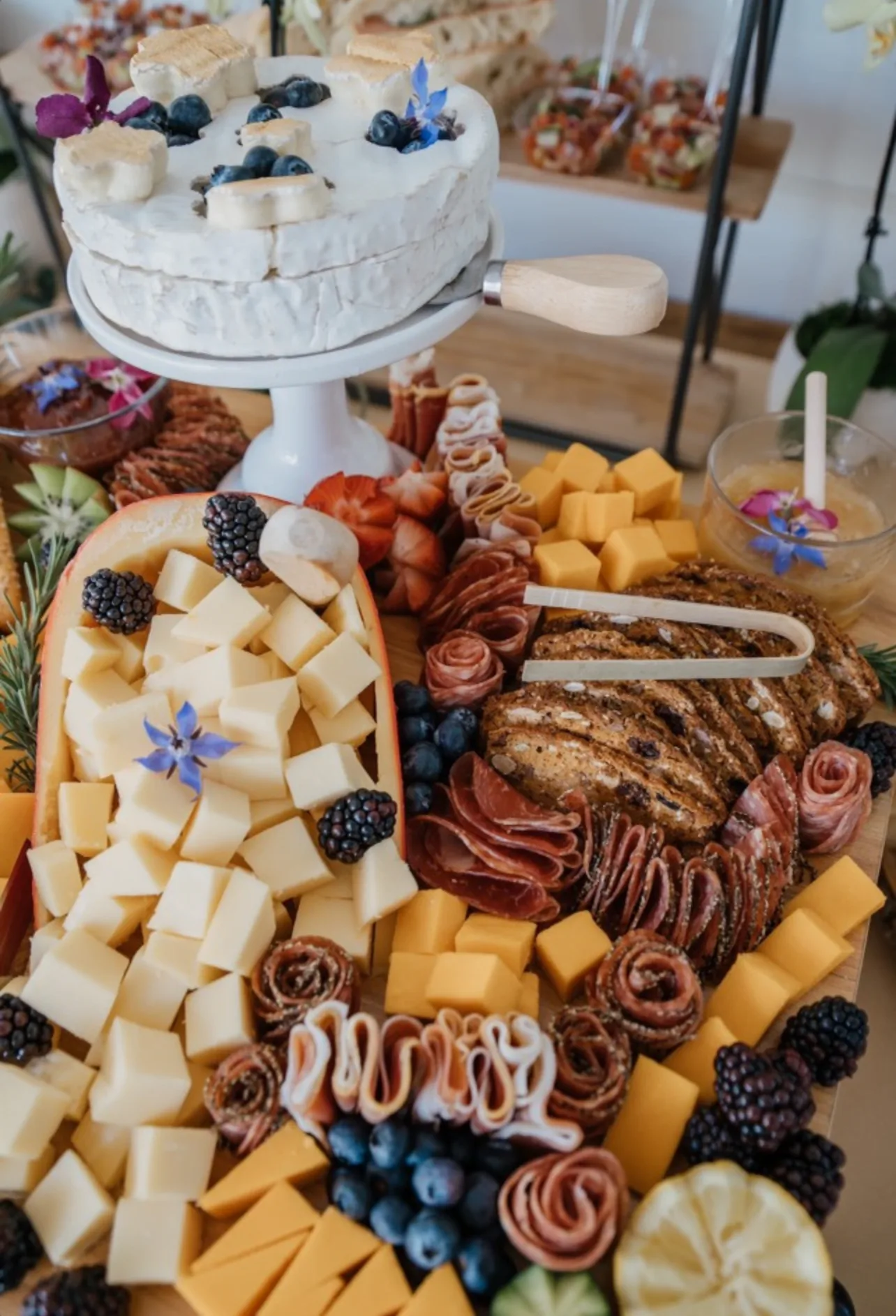 L’Amore classic cheese and charcuterie table with crackers and fruit
