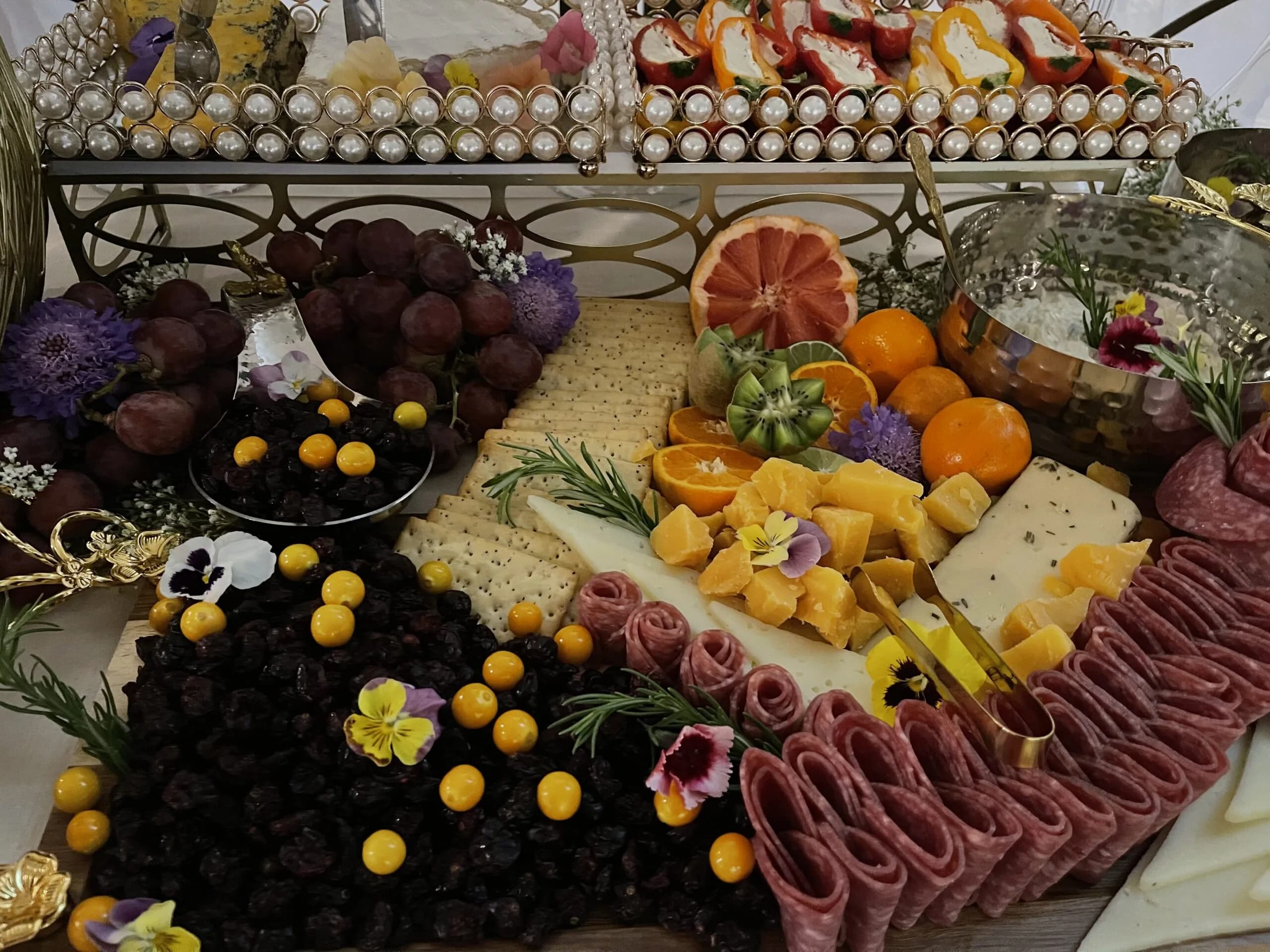 Catering detail with savory bites and colorful event food